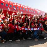 People cheer in front of a new airplane livery for the Panama national soccer team ahead of the 2026 FIFA World Cup on Tuesday in Everett. (Will Geschke / The Herald)
