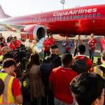 Attendees look at the new airplane livery for the Panama national football team ahead of the 2026 FIFA World Cup on Tuesday in Everett. (Will Geschke / The Herald)