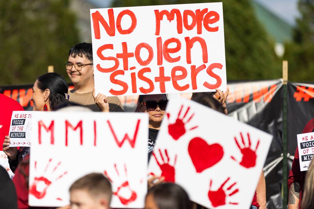 Cynthia Leon-Ortiz holds a sign reading, No more stolen sisters, during a rally in honor of missing and murdered Indigenous people on Tuesday, May 5, 2026, in Tulalip, Washington. (Olivia Vanni / The Herald)