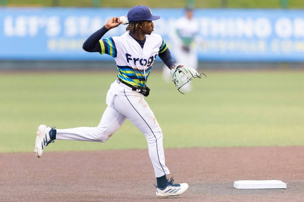 Felnin Celesten #5 of the Everett AquaSox makes a play to first base during the game against the Hillsboro Hops on Wednesday, May 6, 2026 in Everett, Washington. (Olivia Vanni / The Herald)