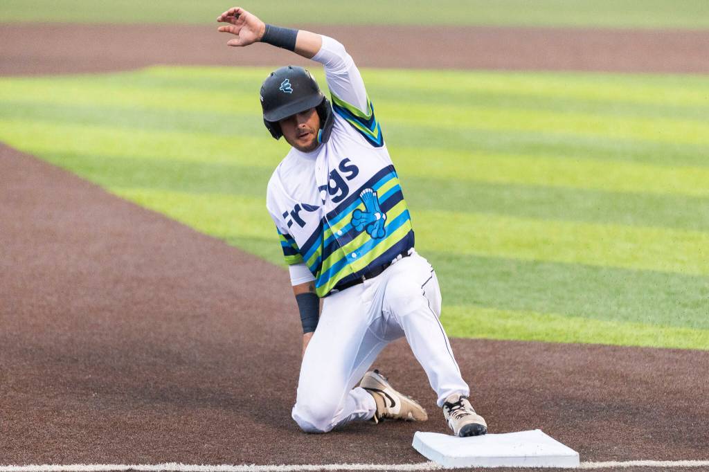 Austin St. Laurent #13 of the Everett AquaSox slides into third base during the game against the Hillsboro Hops on Wednesday, May 6, 2026 in Everett, Washington. (Olivia Vanni / The Herald)