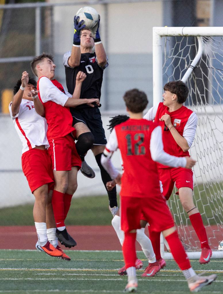 Snohomishs Zachary Khorrami jumps to make a save during the loser-out 3A district playoff game against Mountlake Terrace on Thursday, May 7, 2026 in Snohomish, Washington. (Olivia Vanni / The Herald)