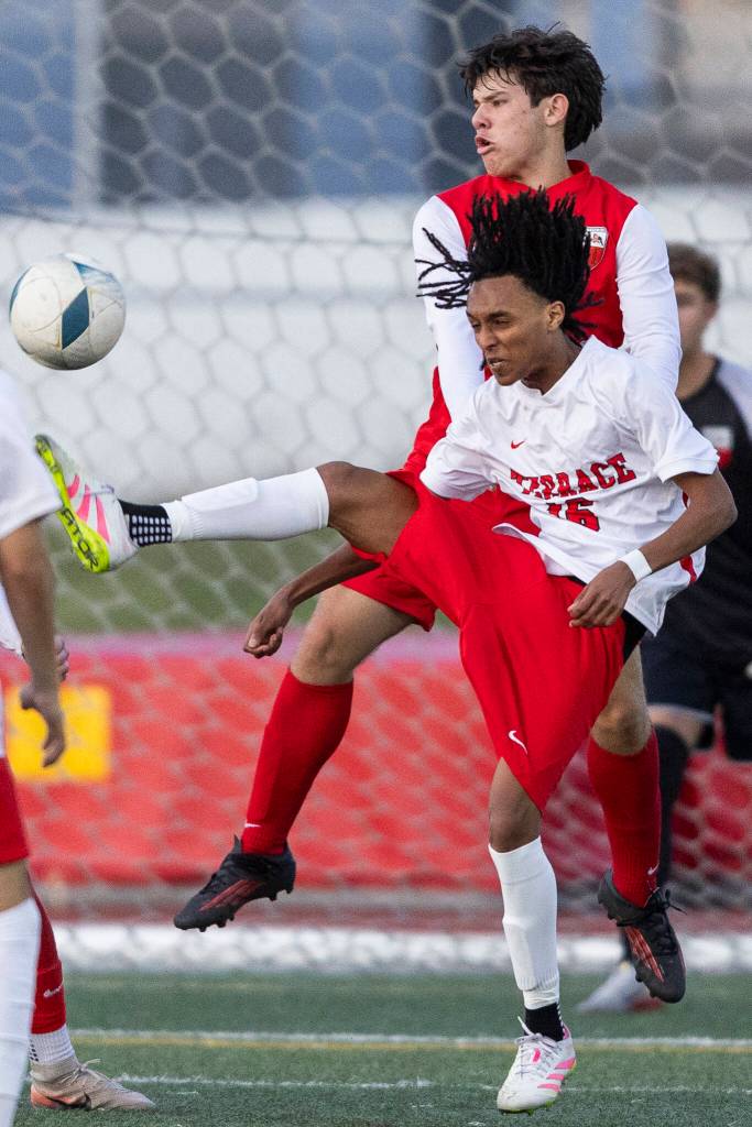 Mountlake Terraces Thomas Dogol tries to kick the ball behind him during the loser-out 3A district playoff game against Snohomish on Thursday, May 7, 2026 in Snohomish, Washington. (Olivia Vanni / The Herald)