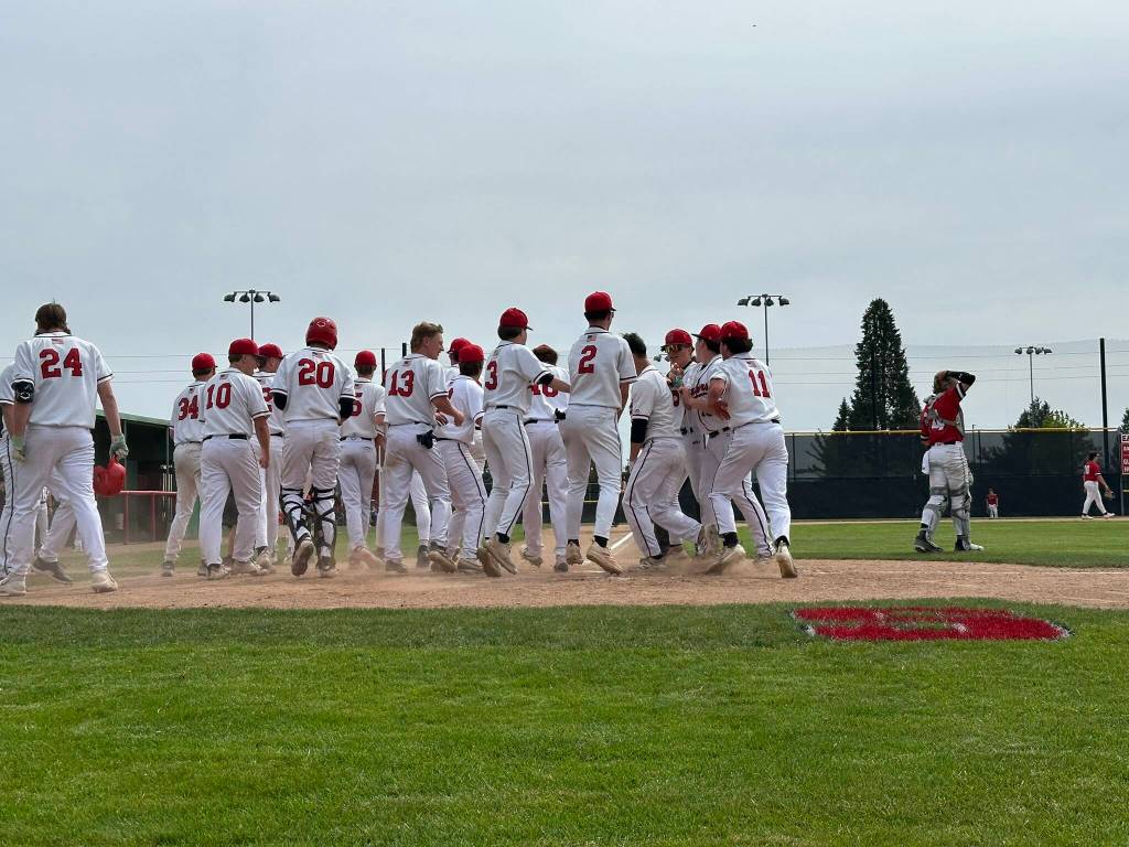 The Snohomish baseball team celebrates Reve LeRouxs second-inning two-run homer during a District 1 3A quarterfinal game against Mountlake Terrace on Saturday, May 9, 2026 at Snohomish H.S. in Snohomish. (Qasim Ali / The Herald)