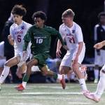 Edmonds-Woodways Natan Ghebreamlak dribbles the ball during a March 31, 2026 match in Edmonds, Washington. (Olivia Vanni / The Herald)