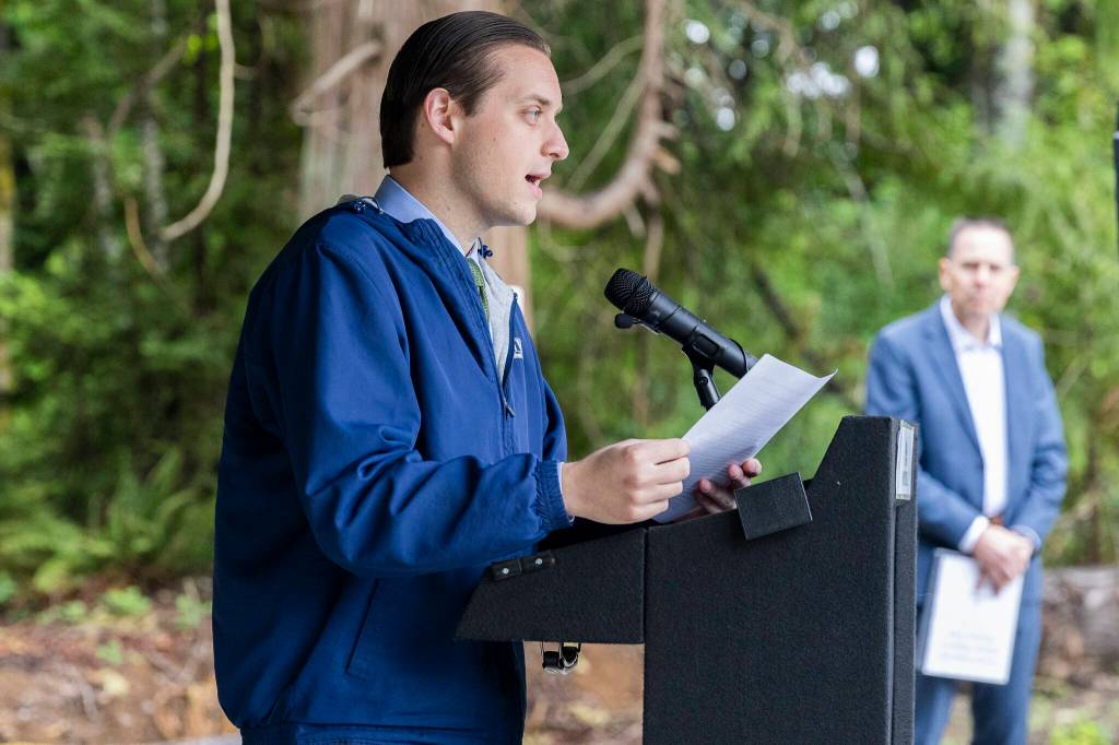 Marysville City Council member Peter Condyles explains the history behind Mother Natures Window Park during a ribbon cutting event for the park on Thursday, May 14, 2026 in Marysville, Washington. (Olivia Vanni / The Herald)