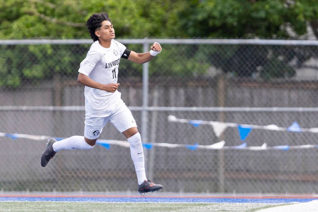 Lynnwoods Henrry Torres-Hernandez reacts after scoring during the 3A district semifinal game against Shorewood on Tuesday, May 12, 2026 in Shoreline, Washington. (Olivia Vanni / The Herald)