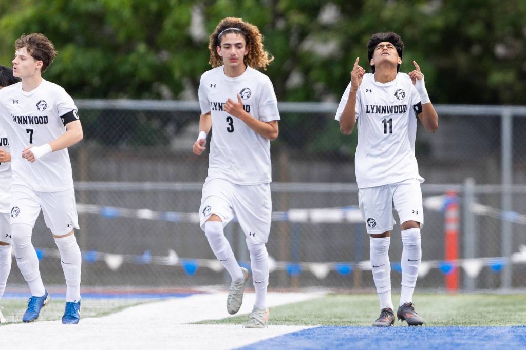 Lynnwoods Henrry Torres-Hernandez reacts after scoring during the 3A district semifinal game against Shorewood on Tuesday, May 12, 2026 in Shoreline, Washington. (Olivia Vanni / The Herald)