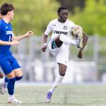 Lynnwoods Anthony Onyango controls the ball while under pressure from Shorewoods Nikola Genadiev during the 3A district semifinal game on Tuesday, May 12, 2026 in Shoreline, Washington. (Olivia Vanni / The Herald)