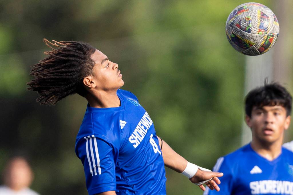 Shorewoods Meiron Bereket heads the ball during the 3A district semifinal game against Lynnwood on Tuesday, May 12, 2026 in Shoreline, Washington. (Olivia Vanni / The Herald)