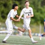 Lynnwoods Vladyslav Tarasiuk celebrates after scoring with Lynnwoods Henrry Torres-Hernandez during the 3A district semifinal game against Shorewood on Tuesday, May 12, 2026 in Shoreline, Washington. (Olivia Vanni / The Herald)
