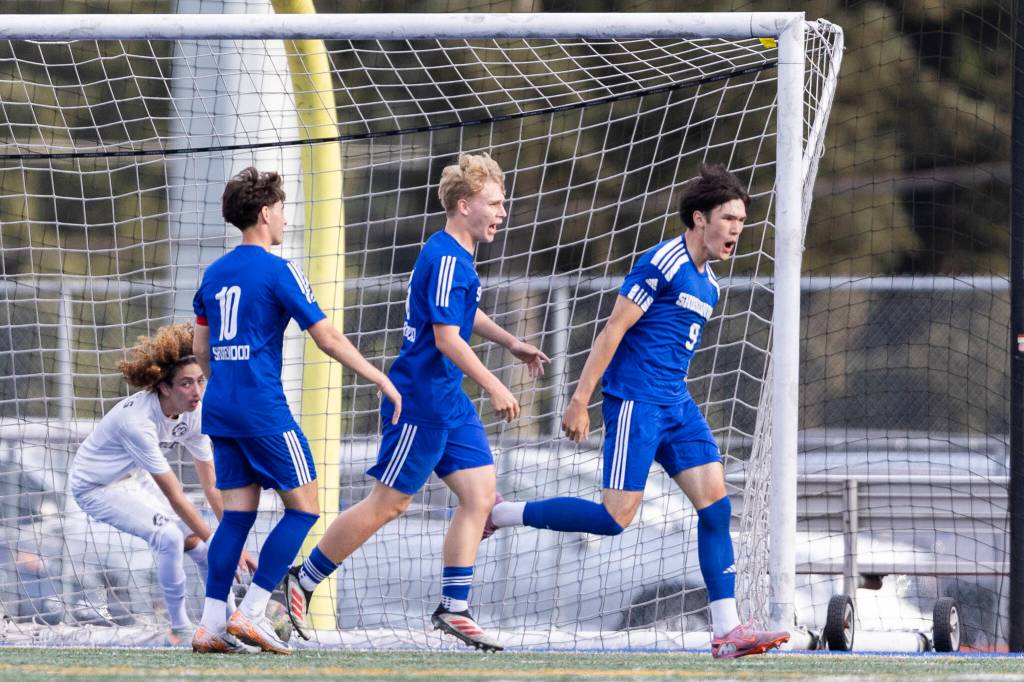 Shorewoods Kaito Ayers reacts after scoring during the 3A district semifinal game against Lynnwood on Tuesday, May 12, 2026 in Shoreline, Washington. (Olivia Vanni / The Herald)