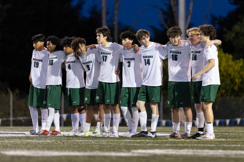 Edmonds-Woodway players line up for penalty kicks during the 3A district semifinal game against Shorecrest on Tuesday, May 12, 2026 in Shoreline, Washington. (Olivia Vanni / The Herald)