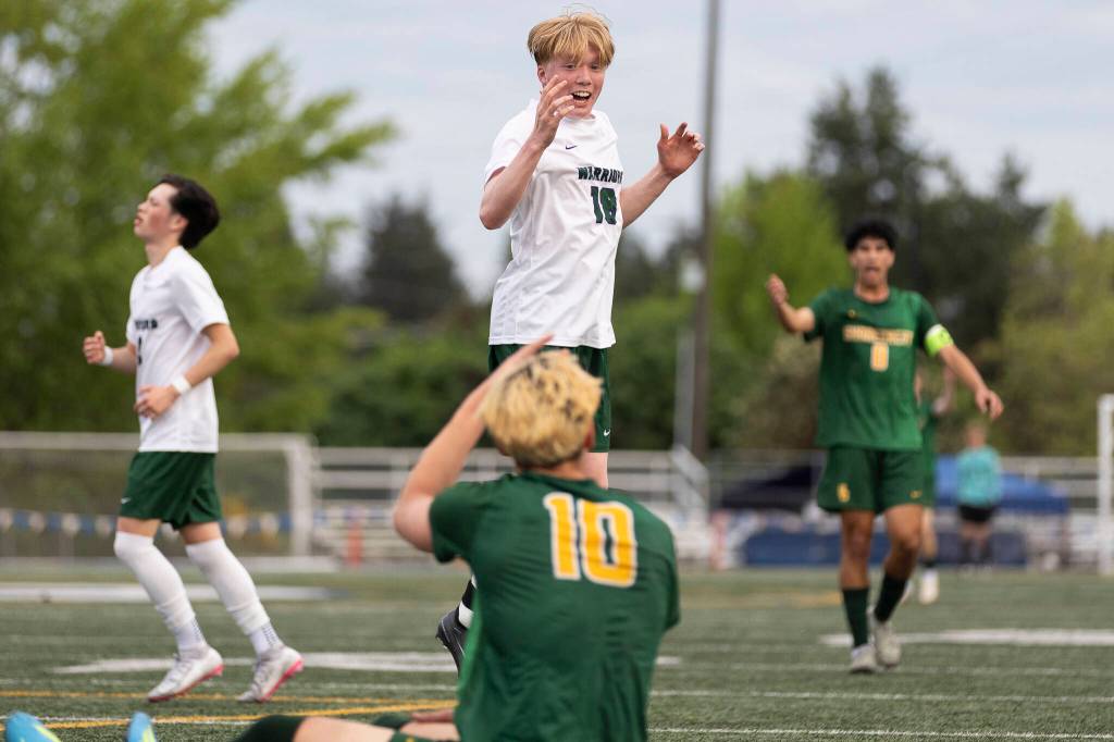 Edmonds-Woodways Jonah Sutcliffe reacts after he is called for a foul on Shorecrests Cole Ambrose during the 3A district semifinal gameon Tuesday, May 12, 2026 in Shoreline, Washington. (Olivia Vanni / The Herald)