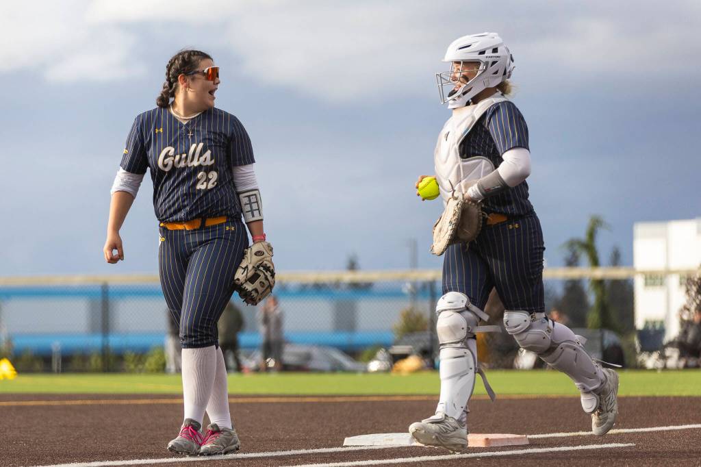 Everetts Alyssa Iverson celebrates a tag out made by Everetts Haylie Oyler during the 3A district championship game against Sedro-Woolley on Thursday, May 14, 2026 in Everett, Washington. (Olivia Vanni / The Herald)