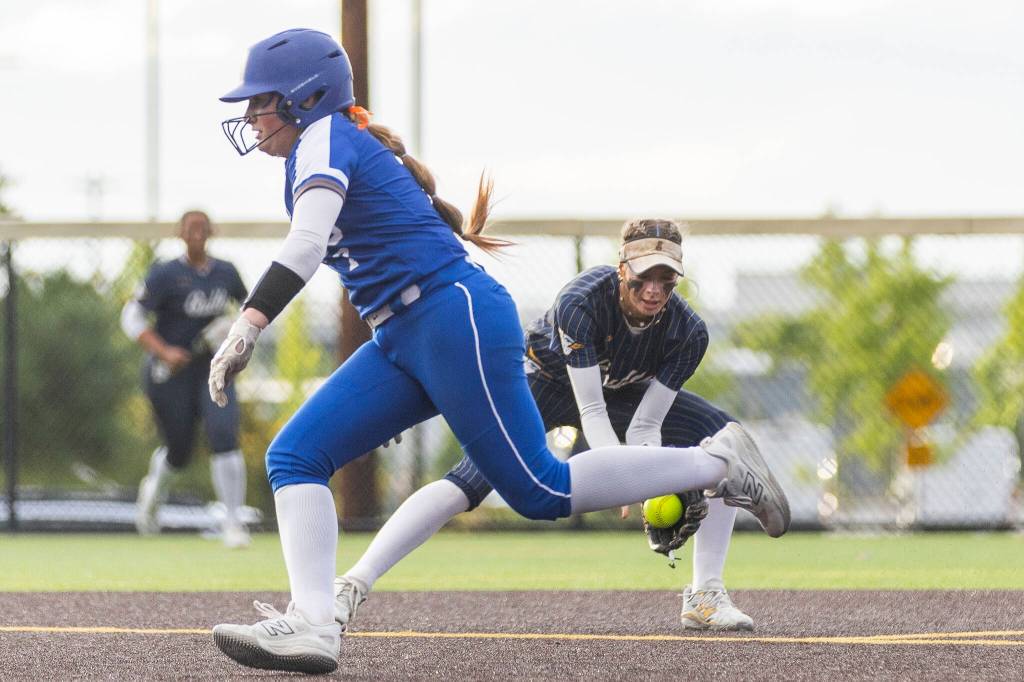 Everetts Mia Hoekendorf fields the ball during the 3A district championship game against Sedro-Woolley on Thursday, May 14, 2026 in Everett, Washington. (Olivia Vanni / The Herald)