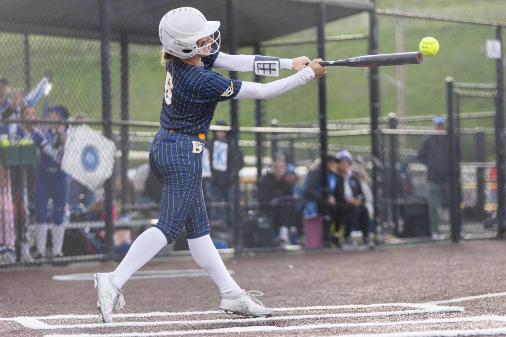 Everetts Anna Luscher reaches to foul off the ball during the 3A district championship game against Sedro-Woolley on Thursday, May 14, 2026 in Everett, Washington. (Olivia Vanni / The Herald)