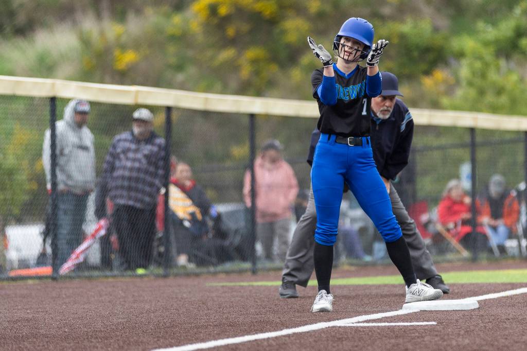 Shorewoods Alyssa Carver reacts after getting to third base during the 3A district loser-out game against Snohomish on Thursday, May 14, 2026 in Everett, Washington. (Olivia Vanni / The Herald)