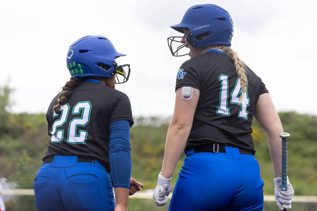 Shorewoods Zoey Perreault and Shorewoods Rose Gallagher react after scoring during the 3A district loser-out game against Snohomish on Thursday, May 14, 2026 in Everett, Washington. (Olivia Vanni / The Herald)