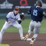 Everett AquaSox shortstop Colt Emerson catches the ball at second base for the first out in a double play during the Opening Day game against the Hillsboro Hops on Tuesday, April 8, 2025 in Everett, Washington. (Olivia Vanni / The Herald)