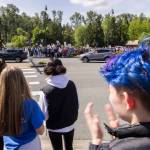 More than 200 students and community members line Bothell Way in protest of the school boards vote to not renew the contract for Bothell High Schools school resource officer on Monday, May 18, 2026, in Bothell, Washington. (Olivia Vanni / The Herald)