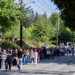 More than 200 students walk out of Bothell High School in protest of the school boards vote to not renew the contract for their school resource officer on Monday, May 18, 2026, in Bothell, Washington. (Olivia Vanni / The Herald)