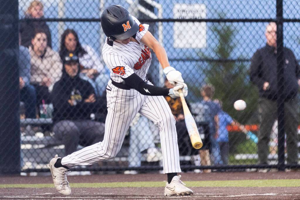 Monroes Mike Enrico gets a hit during the 3A state opening round loser-out game against Enumclaw on Tuesday, May 19, 2026 in Monroe, Washington. (Olivia Vanni / The Herald)