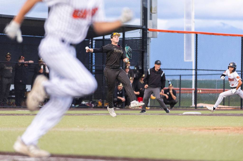 Enumclaws Oliver Potts makes a throw to first base for an out during the 3A state opening round loser-out game against Monroe on Tuesday, May 19, 2026 in Monroe, Washington. (Olivia Vanni / The Herald)