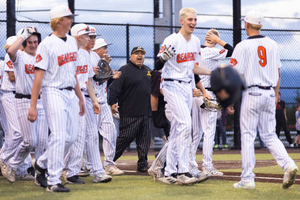 Enumclaw head coach Jamey Ingersoll yells at the umpire after his pitcher is called for a balk with the bases loaded to walk in the game-winning run for Monroe in the 3A state opening round loser-out game on Tuesday, May 19, 2026 in Monroe, Washington. (Olivia Vanni / The Herald)