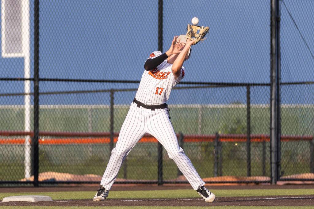 Monroes AJ Welch makes a catch in the infield during the 3A state opening round loser-out game against Enumclaw on Tuesday, May 19, 2026 in Monroe, Washington. (Olivia Vanni / The Herald)