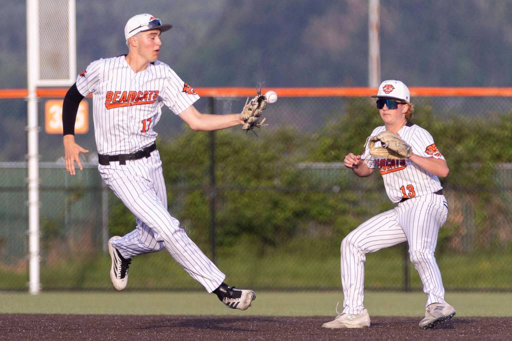 Monroes AJ Welch bobbles the ball in the infield during the 3A state opening round loser-out game against Enumclaw on Tuesday, May 19, 2026 in Monroe, Washington. (Olivia Vanni / The Herald)