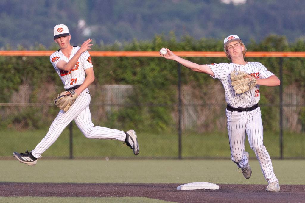 Monroes Adam Manke makes an out at second and turns to throw the ball to first base for a double play during the 3A state opening round loser-out game against Enumclaw on Tuesday, May 19, 2026 in Monroe, Washington. (Olivia Vanni / The Herald)