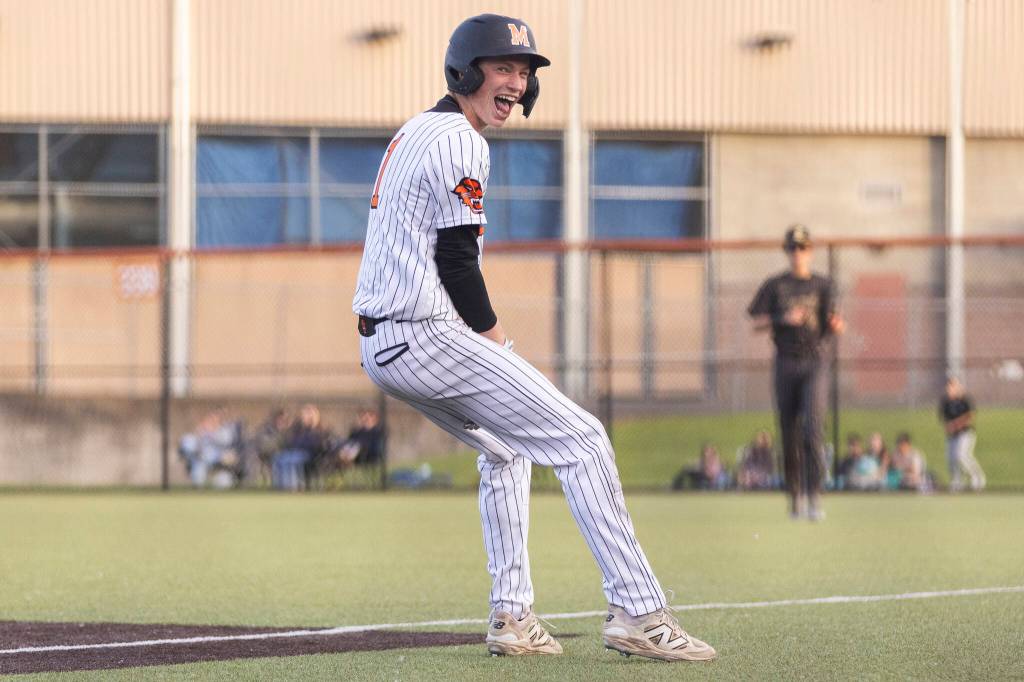 Monroes Caleb Campbell reacts after making it to first base during the 3A state opening round loser-out game against Enumclaw on Tuesday, May 19, 2026 in Monroe, Washington. (Olivia Vanni / The Herald)