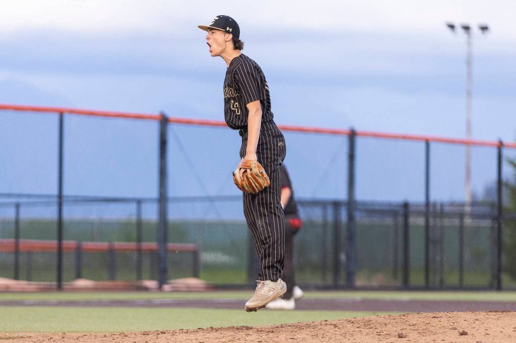 Enumclaws Russell Zimmer reacts after getting a strikeout during the 3A state opening round loser-out game against Monroe on Tuesday, May 19, 2026 in Monroe, Washington. (Olivia Vanni / The Herald)