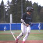 Shorewoods Adam Jaramillo celebrates after scoring the opening run in a state baseball game against Central Valley on Tuesday, May 19, 2026 at Meridian Park Baseball Field in Shoreline. (Qasim Ali / The Herald)