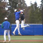 Shorewoods Finn Bachler (5) celebrates a double play with his teammates during a state baseball game against Central Valley on Tuesday, May 19, 2026 at Meridian Park Baseball Field in Shoreline. (Qasim Ali / The Herald)