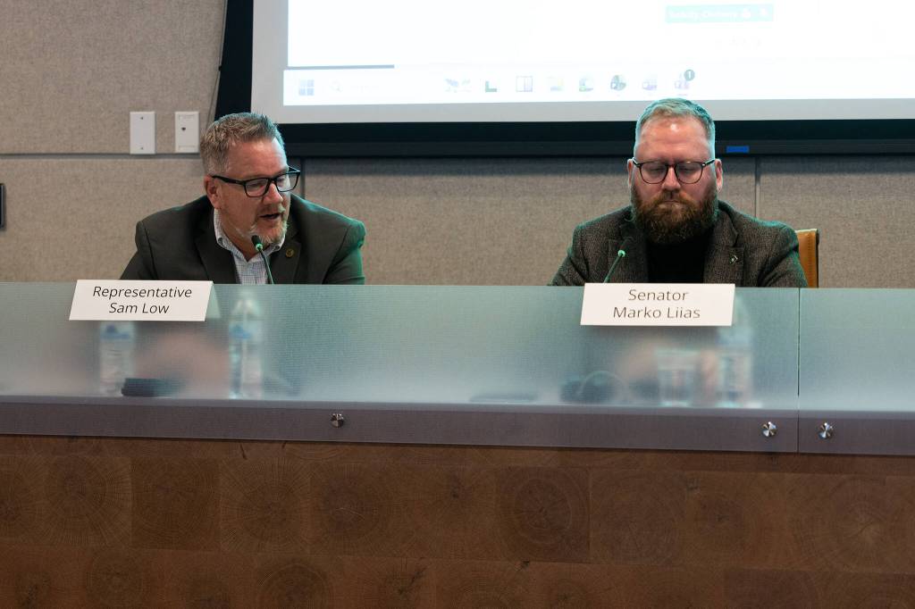 Will Geschke / The Herald 
State Rep. Sam Low, left, speaks alongside State Sen. Marko Liias during a roundtable discussion in Everett on Tuesday regarding the design and replacement of the U.S. 2 trestle.