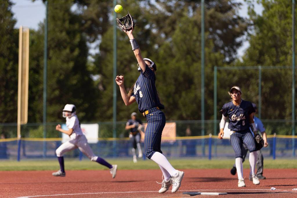 Everetts Anna Luscher makes a catch in the infield during the 3A state opening round loser-out game against Garfield on Friday, May 22, 2026 in Lacey, Washington. (Olivia Vanni / The Herald)