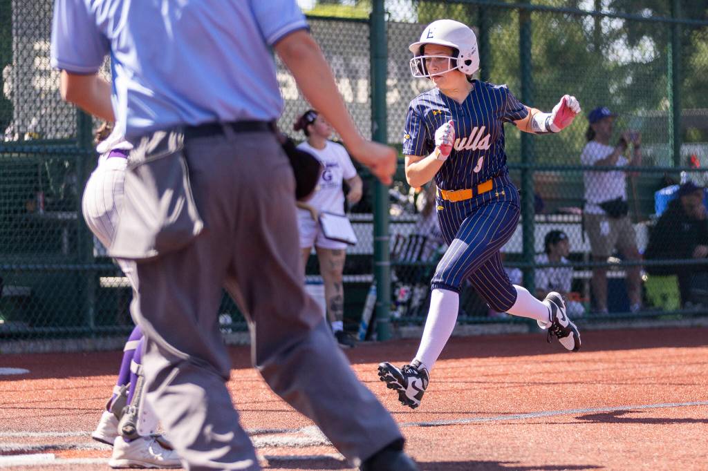 Everetts Presley Eshelman scores during the 3A state opening round loser-out game against Garfield on Friday, May 22, 2026 in Lacey, Washington. (Olivia Vanni / The Herald)