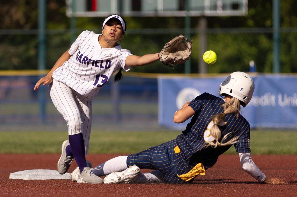 Everetts Mia Hoekendorf slides safely into second base during the 3A state opening round loser-out game against Garfield on Friday, May 22, 2026 in Lacey, Washington. (Olivia Vanni / The Herald)