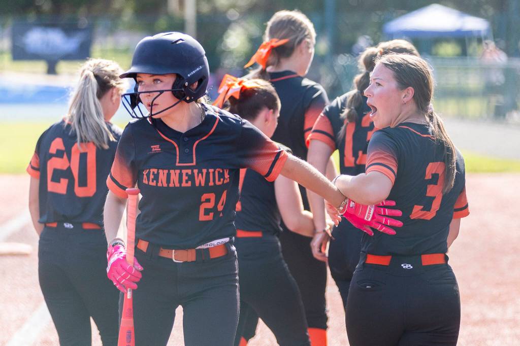 Kennewick players react to a foul ball call by the home plate umpire during the 3A state quarterfinal game against Kennewick on Friday, May 22, 2026 in Lacey, Washington. (Olivia Vanni / The Herald)
