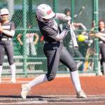 Stanwoods Taylor Almanza gets a hit during the 3A state quarterfinal game against Kennewick on Friday, May 22, 2026 in Lacey, Washington. (Olivia Vanni / The Herald)