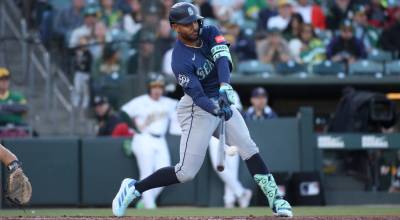 Julio Rodríguez of the Seattle Mariners hits an RBI single during the fourth inning against the Athletics at Sutter Health Park on Tuesday, May 26, 2026, in West Sacramento, California. (Scott Marshall / Getty Images / Tribune News Services)