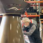 Doug Brown, an associate technical fellow in BCA engineering, working on the cauldron. Brown created the design and led the final assembly in Everett. (Provided photo)