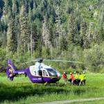 Emergency responders carry volunteer patients to an awaiting helicopter during a training exercise led by the Snohomish County Sheriffs Office on Thursday at the Big Four Ice Caves. (Courtesy of the Snohomish County Sheriffs Office)
