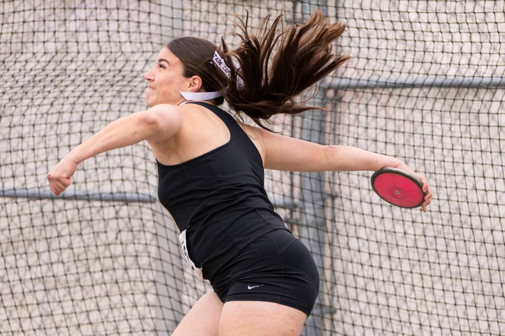 Lynnwoods Ena Dodik warms up before the 3A discus final during the WIAA State Track & Field Championships on Friday, May 29, 2026 in Tacoma, Washington. (Olivia Vanni / The Herald)