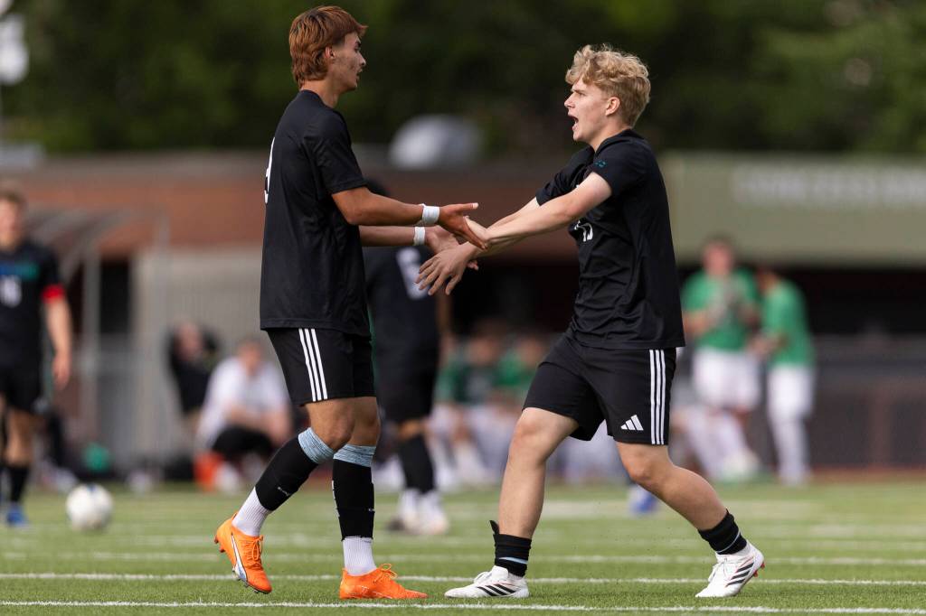 Shorewoods Tajidin Babayev and Shorewoods Julian Shook react during the 3A state semifinal game against Blanchet on Friday, May 29, 2026 in Puyallup, Washington. (Olivia Vanni / The Herald)