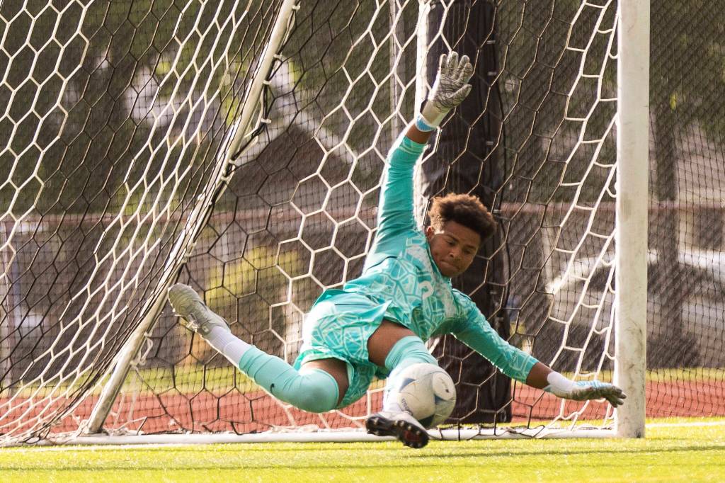 Shorewoods Maxwell Smith blocks a penalty shot during the 3A state semifinal game on Friday, May 29, 2026 in Puyallup, Washington. (Olivia Vanni / The Herald)