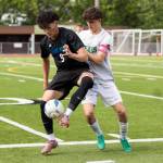 Shorewoods Kaito Ayers controls the ball against Bishop Blanchets Milo McCarthy during the 3A state semifinal game on Friday, May 29, 2026 in Puyallup, Washington. (Olivia Vanni / The Herald)