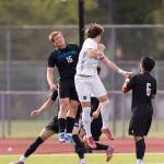 Shorewoods Caleb Butler and Bishop Blanchets Jackson Farrell jump to head the ball during the 3A state semifinal game on Friday, May 29, 2026 in Puyallup, Washington. (Olivia Vanni / The Herald)